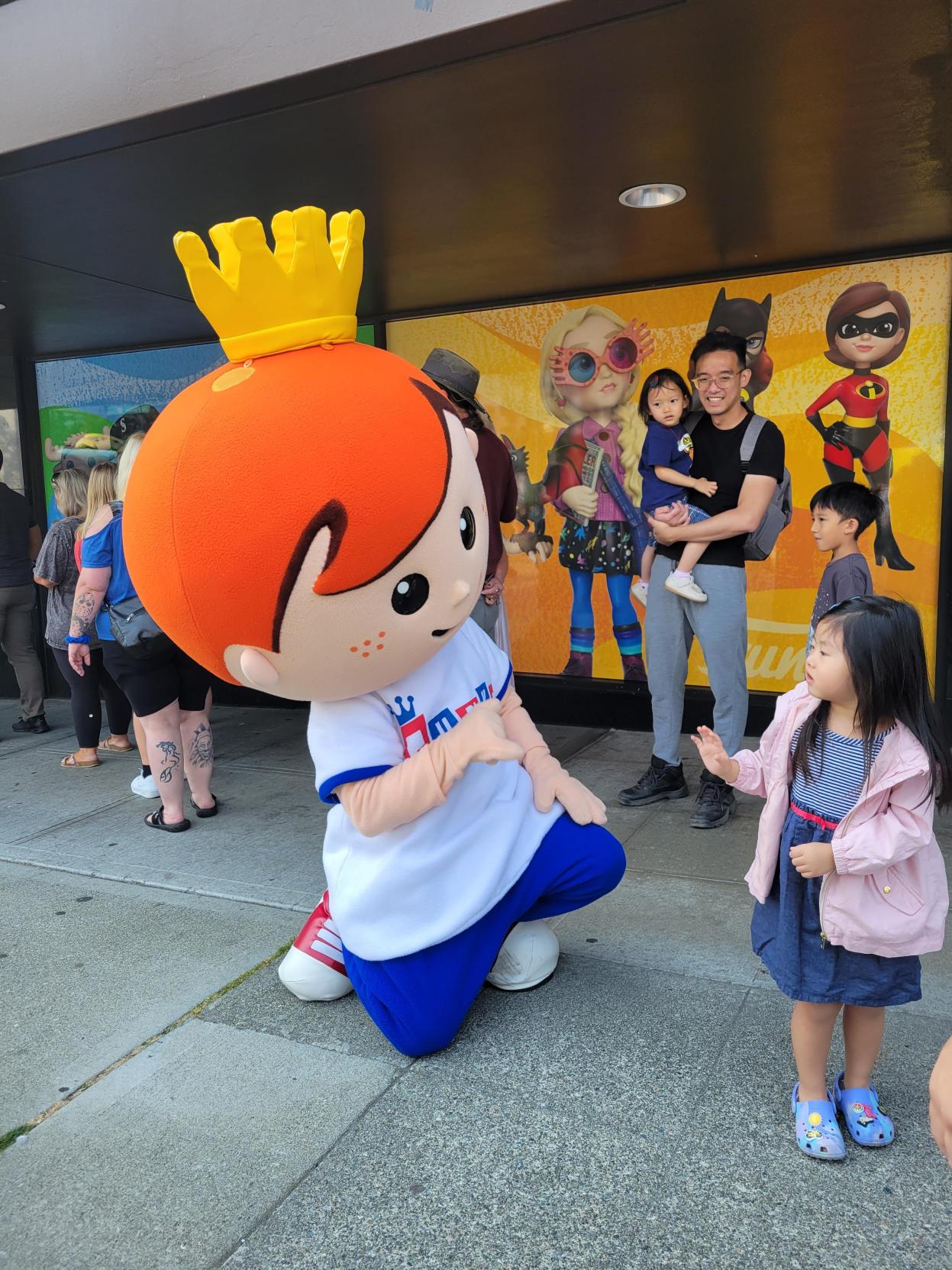 Freddy Funko! Freddy Funko greets Funatics in line outside the Everett store and waves a special hello to a child in line.